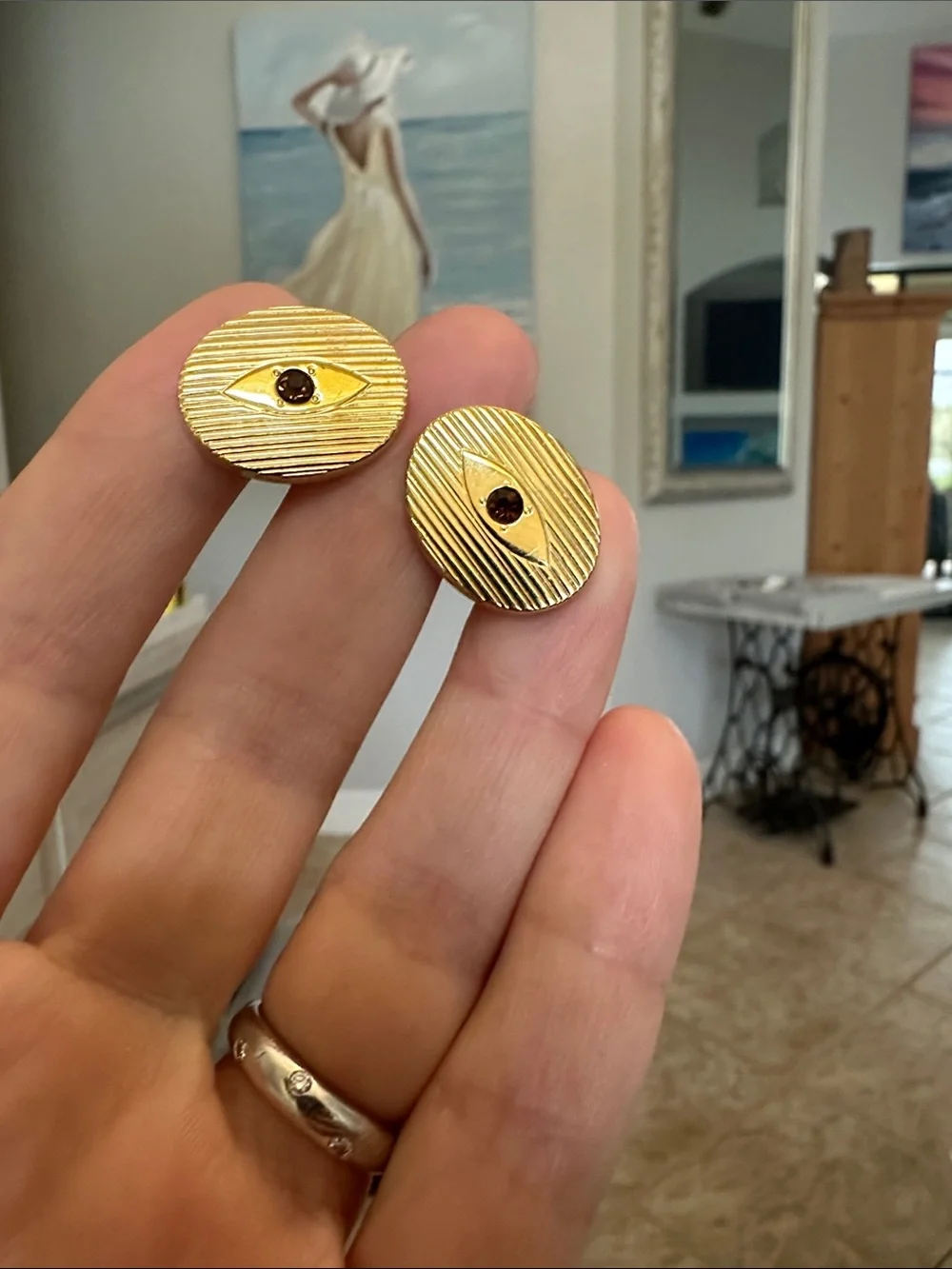Gold Oval Cufflinks with Garnet Center